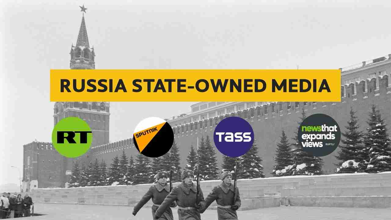 screenshot from linked video - marching Russian soldiers in Red Square - text onscreen: "Russia State-owned media" and logos of RT, TASS, SPUTNIK, and RUPTLY