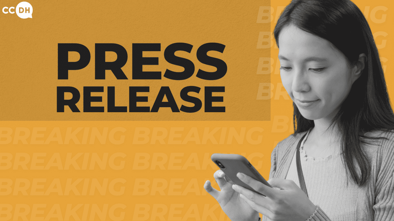 Text: Press release. Woman reading something on her phone