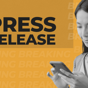 Text: Press release. Woman reading something on her phone