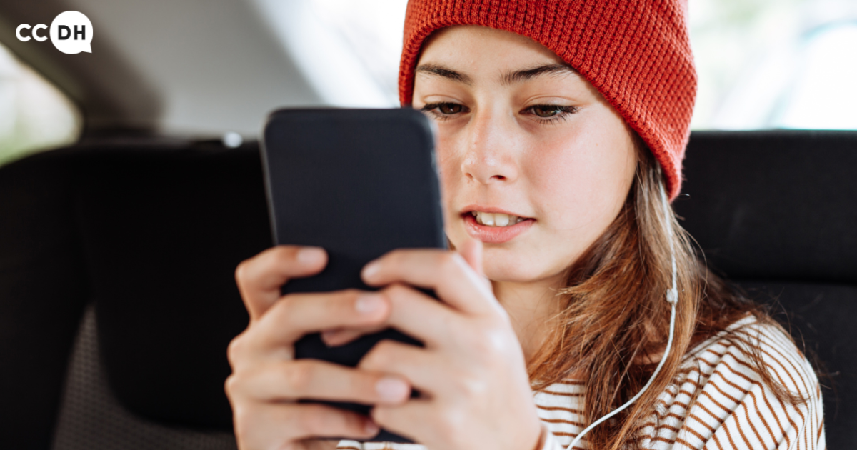 Cover for Protecting Kids Online: Teenage girl looking at her phone.