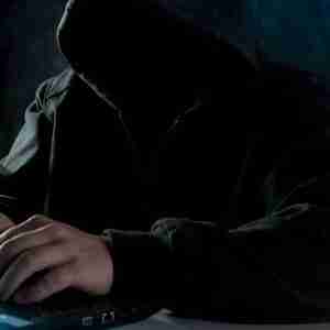 A man in a hoodie using a laptop: incels are usually young men
