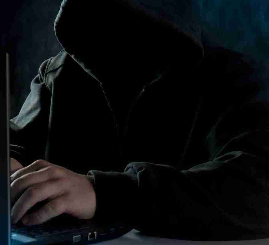 A man in a hoodie using a laptop: incels are usually young men