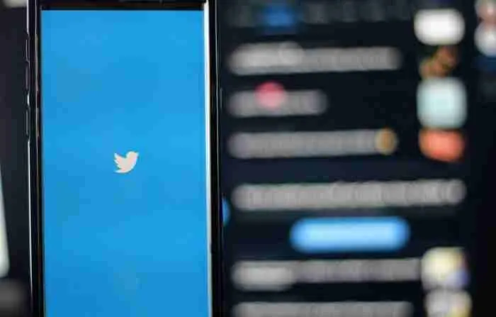 Toxic Twitter: Black mobile phone displaying Twitter logo